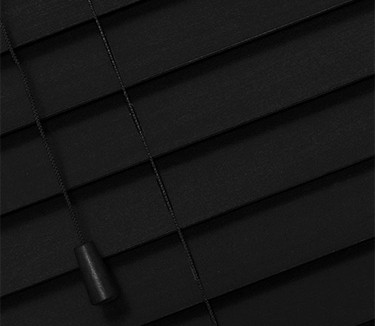 black wooden venetian blinds with cords close up